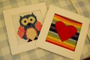 An owl in cross stitch and a heart in long stitch. 